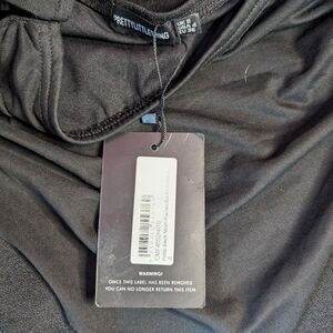 Brand new with tags Black pretty little thing body suit size small